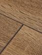 Dark brown oak laminate floor v-groove