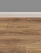 Distressed brown oak laminate with light grey wall
